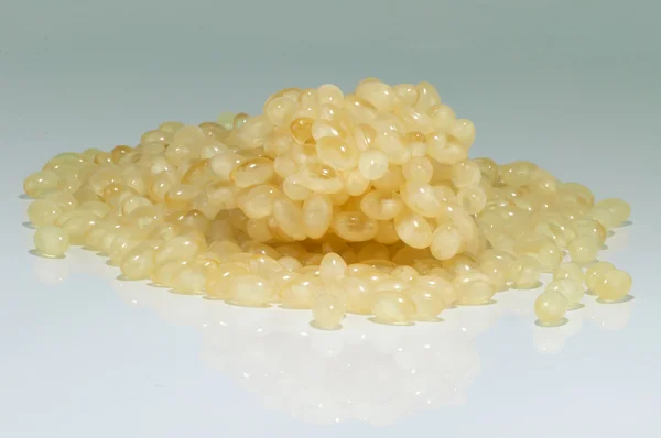 Closeup of group of soft gel capsules — Stock Photo, Image