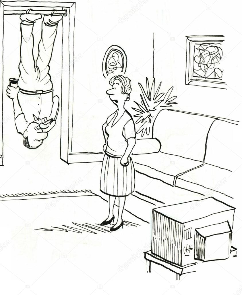 Man hanging upside down and watching TV