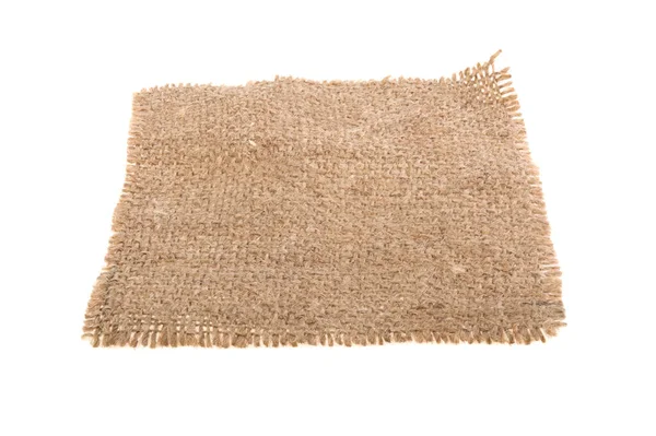 Çuval bezi parçası beyaz arkaplanda izole edildi