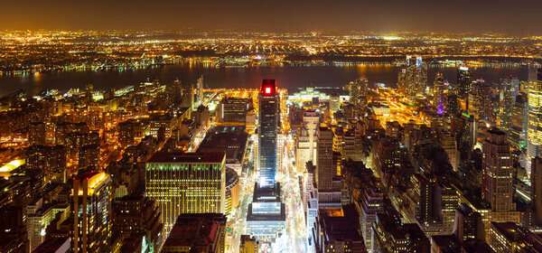 High View over Manhattan West at night, New York City. Looking over Pennsylvania Station, out towards the Hudson River and Jersey City.