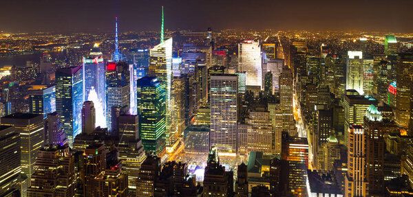 Central and north Manhattan, high view at night, New York City. Capital city of New York state, containing many buildings, tall buildings and skyscrapers