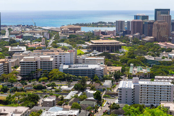 View of Honolulu and Harbor from Punchbowl Crater. Hawaii State Capitol building rear center.