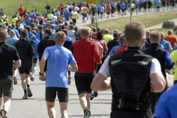 Courir avec d'autres Photo De Stock