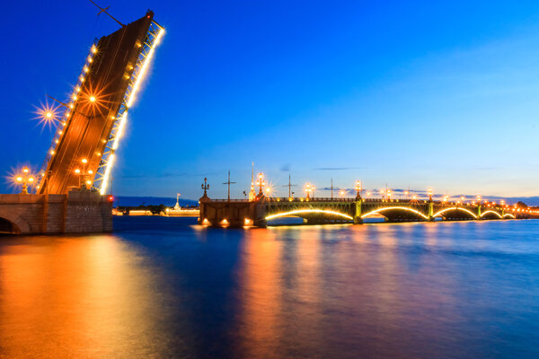 Troitskii bridge over the Neva River in St. Petersburg. White Nights. Russia