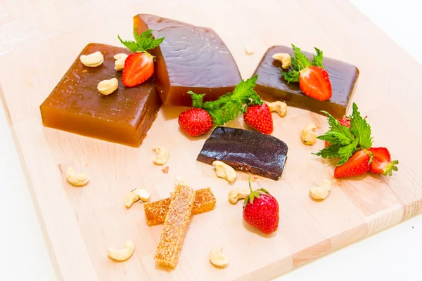 Marmalade with strawberry, nuts, chocolate and cheese — ストック写真