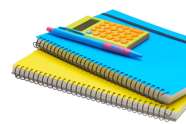 Yellow and blue note book calculator and pen — Stock Photo, Image
