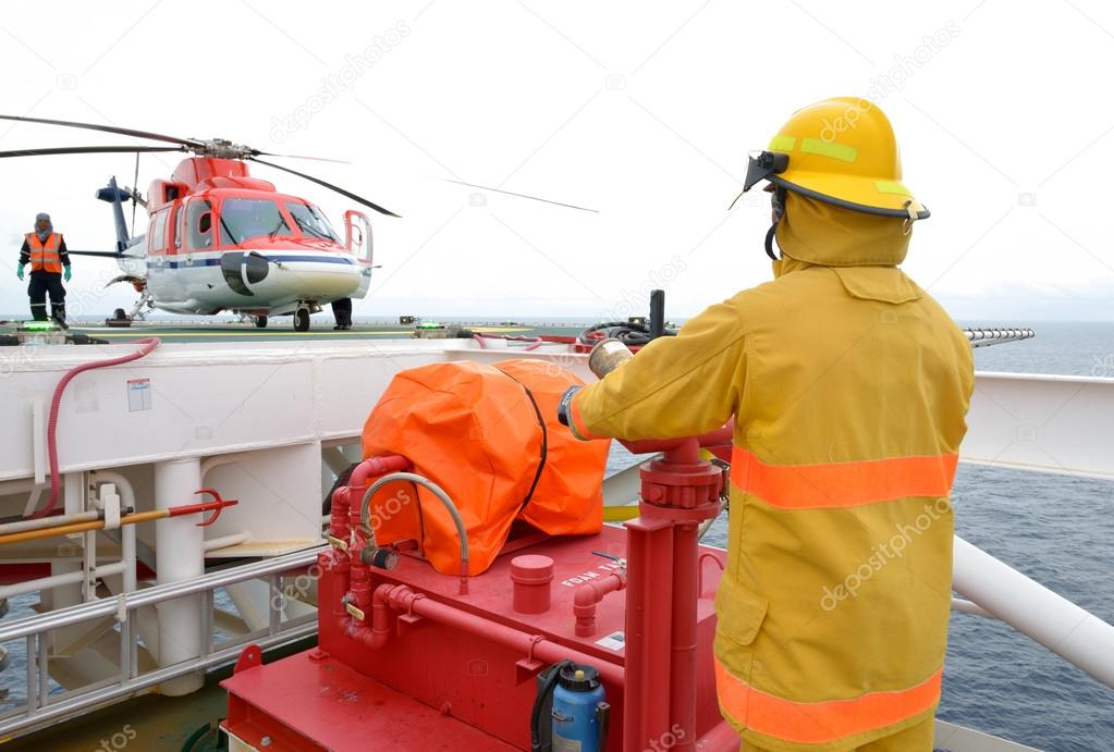 fireman is guarding for offshore helicopter