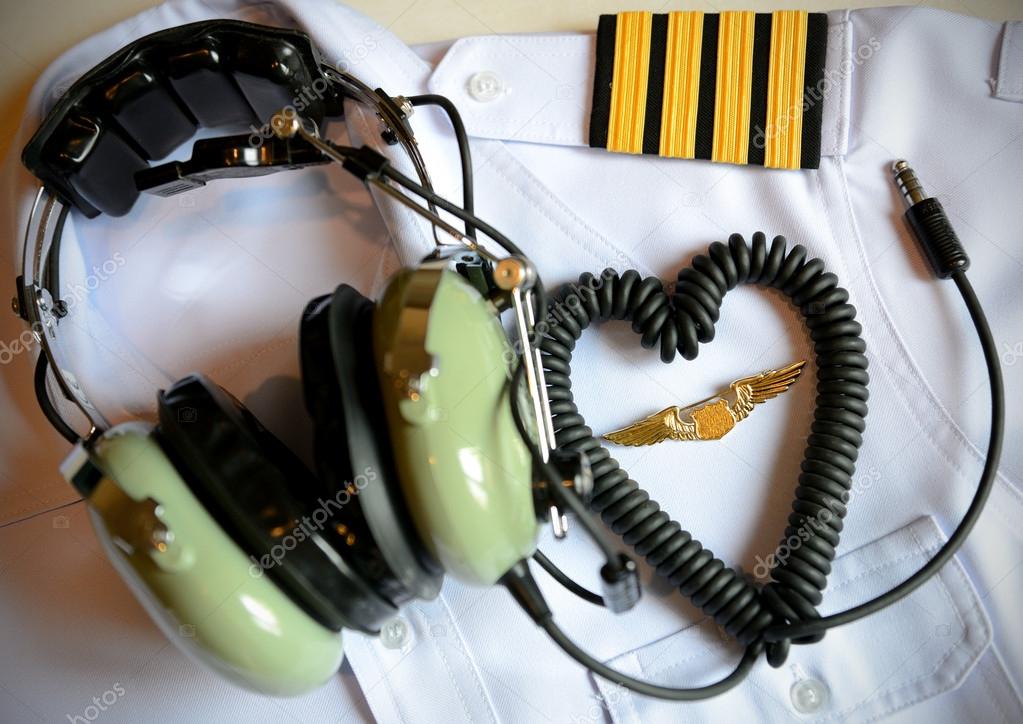 Pilot uniform and headset.