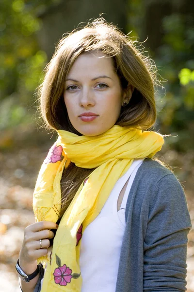 Woman in yellow scarf — Stock Photo, Image