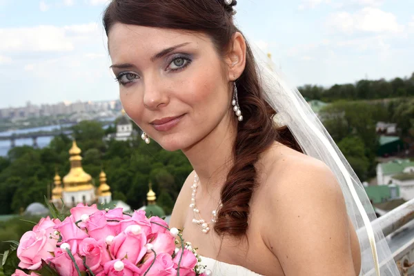 Bride near church — Stock Photo, Image