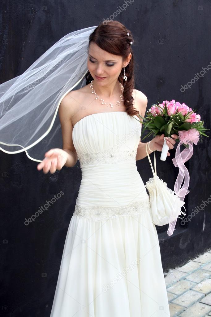 Lovely bride with bouquet