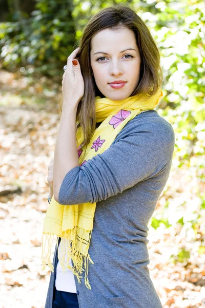 Woman in yellow scarf — Stock Photo, Image