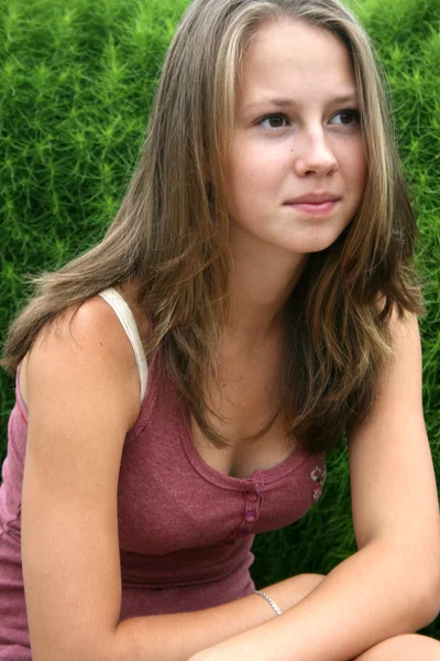 Teenage girl on natural background — Stock Photo, Image