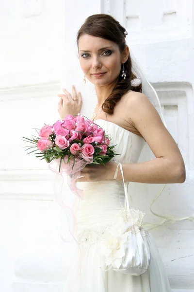 Lovely bride with bouquet — Stock Photo, Image