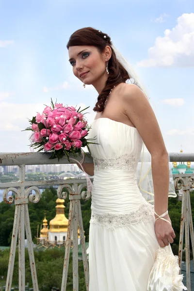 Lovely bride with bouquet — Stock Photo, Image