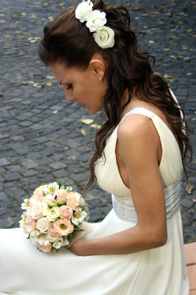 Lovely bride with bouquet — Stock Photo, Image