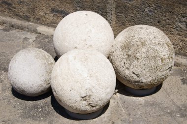 Cannonballs from the fortress of Castel Nuovo Neapolitan clipart