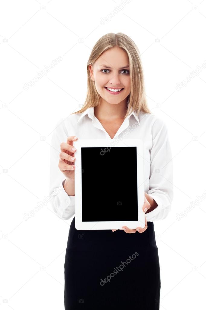 Young woman showing tablet