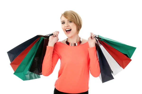 Mulher feliz com sacos de compras — Fotografia de Stock