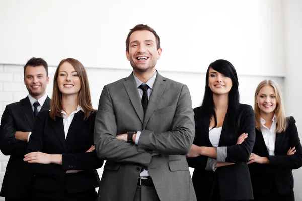 Businesspeople with businessman leader — Stock Photo, Image