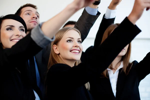 Group of business pointing at target — Stock Photo, Image