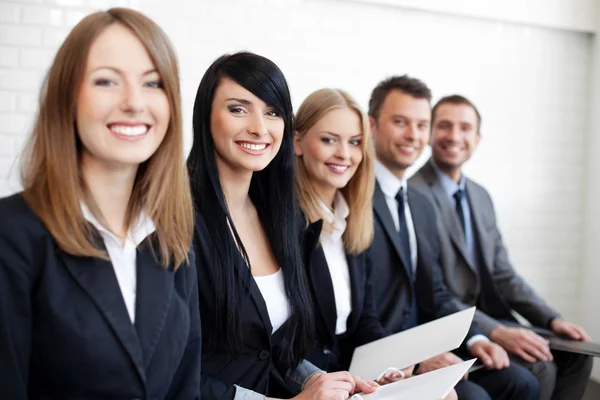 Successful businesswoman in group of — Stock Photo, Image