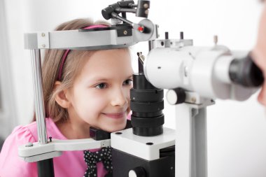 Optometrist performing visual field test clipart