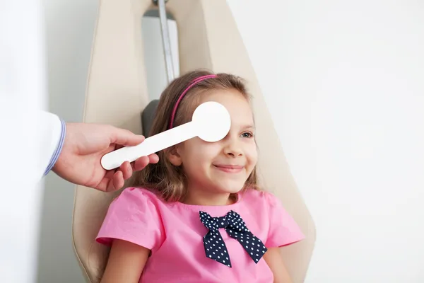 Young girl is having eye exam — Stok fotoğraf