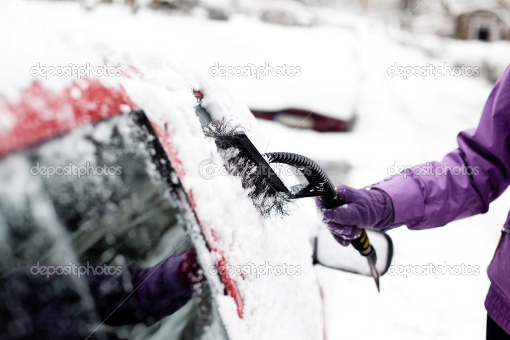 Removing snow from windshield