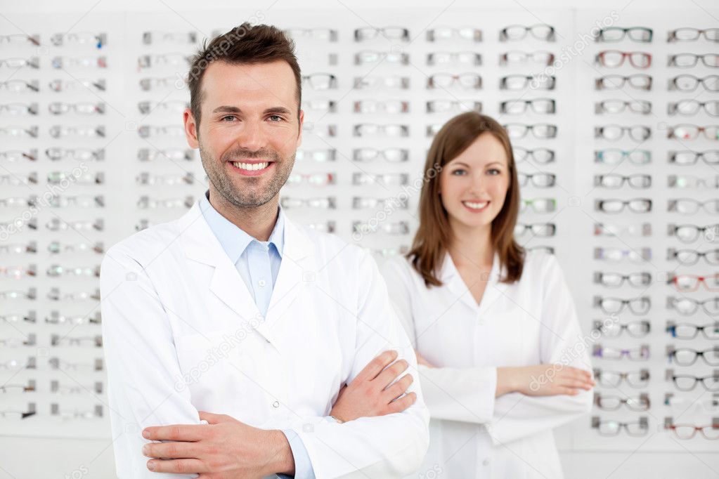 Two happy opticians optometrists