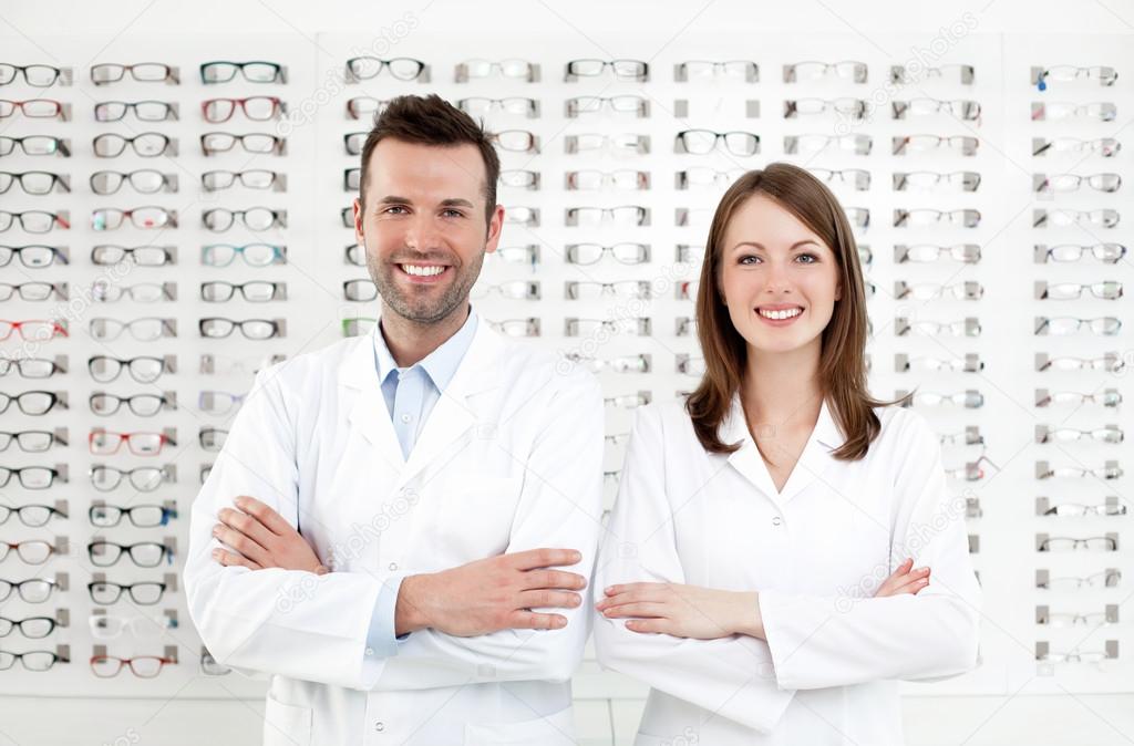Team of happy opticians optometrists