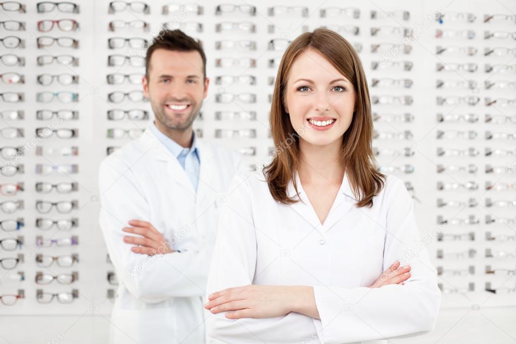 Team of happy opticians optometrists