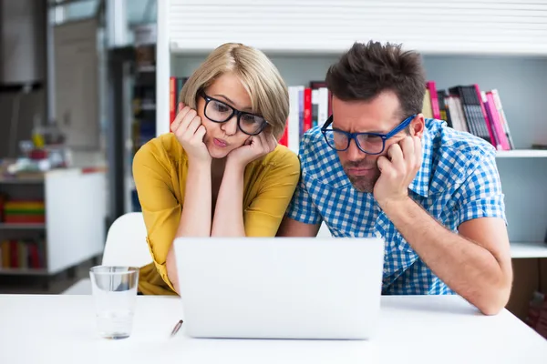 Funny students in library — Stock Photo, Image