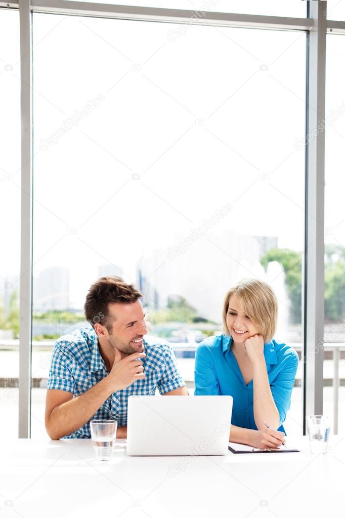 Couple working together in the office