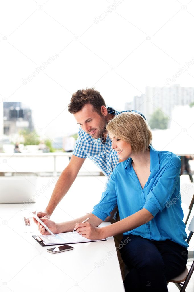 Young couple working together