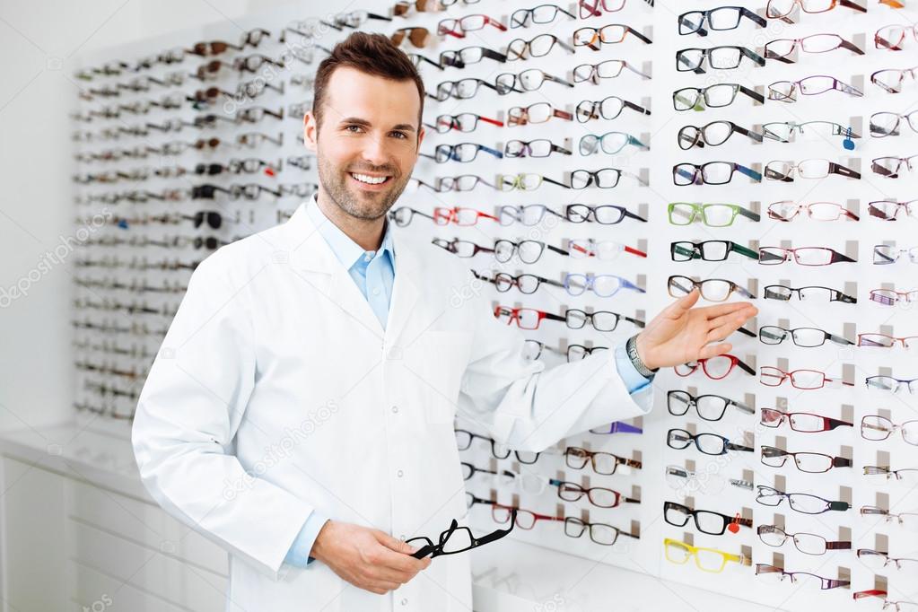 Optician selling glasses