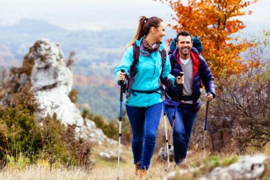 Happy couple hiking clipart