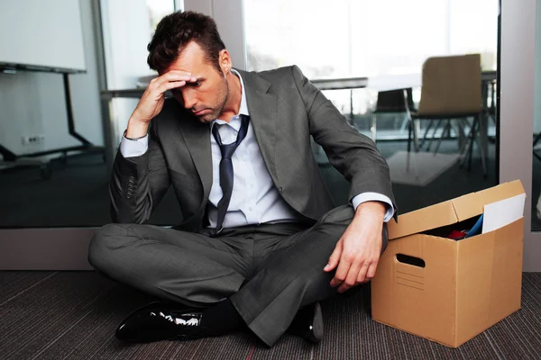 Sad fired businessman — Stock Photo, Image