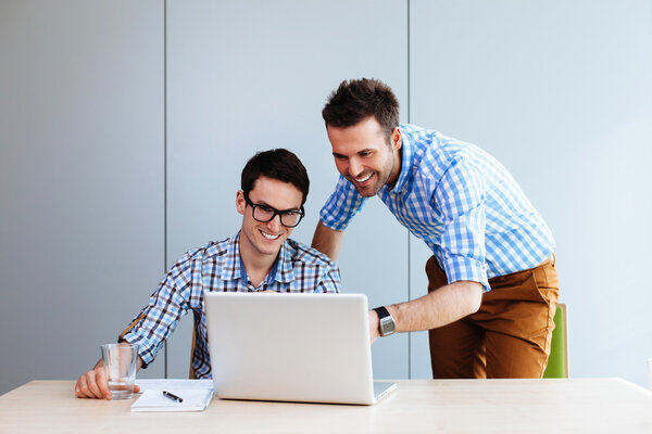 Web designers looking at website