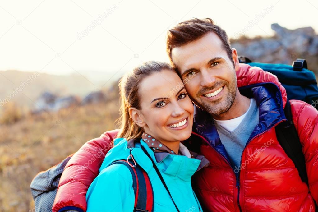 Happy couple of hikers