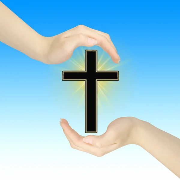 Two hands with the cross — Stock Photo, Image