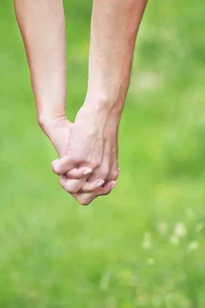 Holding hands — Stock Photo, Image