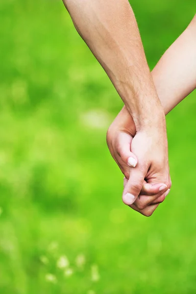 Holding hands — Stock Photo, Image