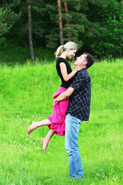 Couple in love on the field — Stock Photo, Image