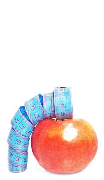 Jabłko z miarą taśmy — Zdjęcie stockowe