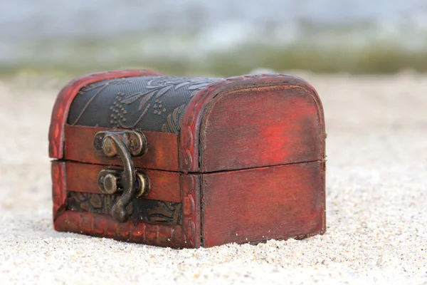 Chest in the sand — Stock Photo, Image