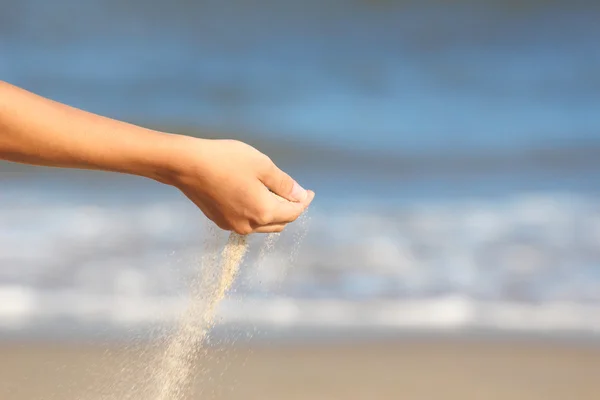 Hands playing with sand — Stock Photo, Image