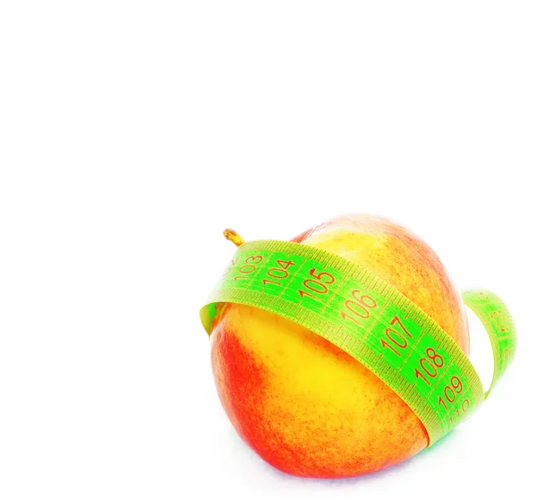 Manzana con cinta métrica —  Fotos de Stock