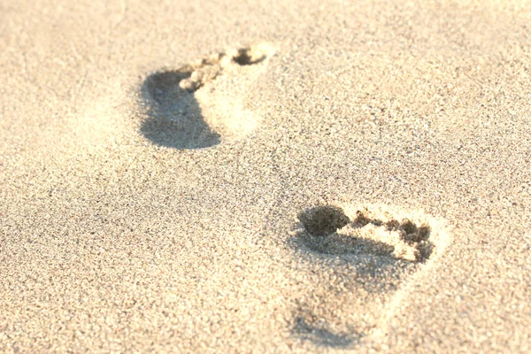 Stopy v písku — Stock fotografie