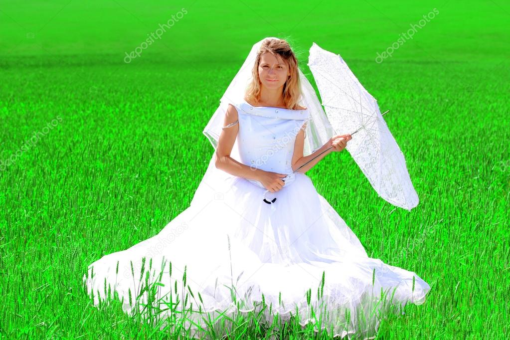 Bride on a field of wheat